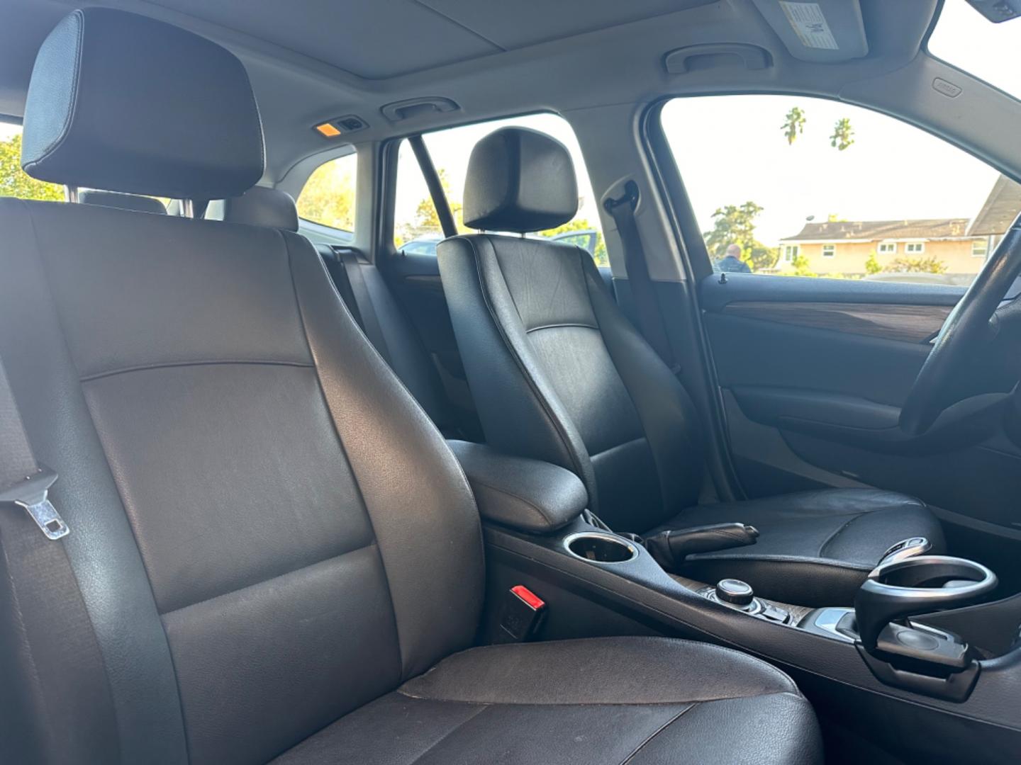 2014 WHITE /Black BMW X1 Leather (WBAVL1C56EV) with an 4 Cylinders engine, AUTOMATIC transmission, located at 30 S. Berkeley Avenue, Pasadena, CA, 91107, (626) 248-7567, 34.145447, -118.109398 - Don't let bad credit or financial setbacks hold you back from owning a luxury SUV like the 2014 BMW X1 xDrive28i. At our BHPH dealership, we're here to make the car-buying process as smooth and stress-free as possible. We invite you to visit our dealership in Pasadena, CA, to explore our inventory o - Photo#11